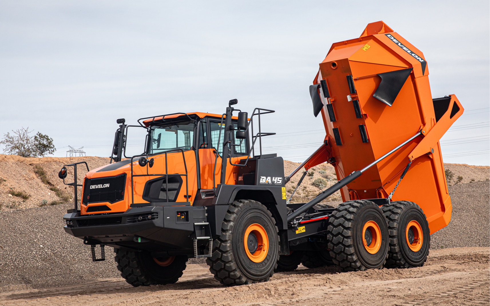 Wheel Loader Dumping Snow