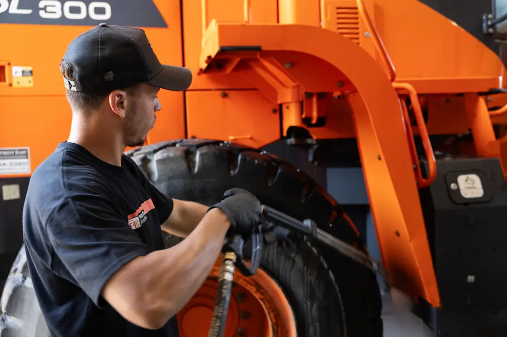 Technician repairing equipment